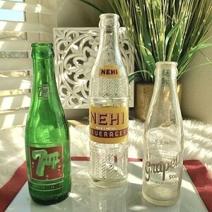 VINTAGE SODA BOTTLES  GROUP OF 3 - 7UP, GRAPETTE  & NEHI
